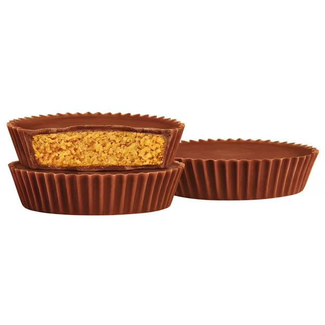 Chocolate peanut butter cups on a white background