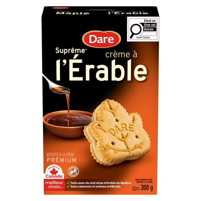Box of Dare Suprème crème à l'érable maple cream biscuits with a cookie and syrup on an orange background.